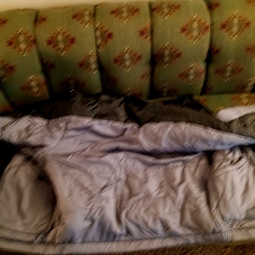 grey's and black winter coat